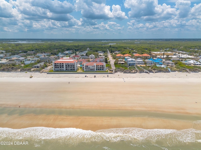 bird's eye view featuring a water view, a residential view, and a view of the beach