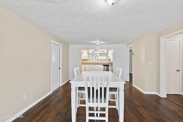 dining room featuring dark hardwood / wood-style floors