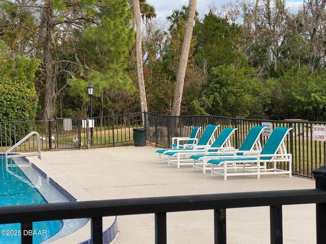 view of pool with a patio