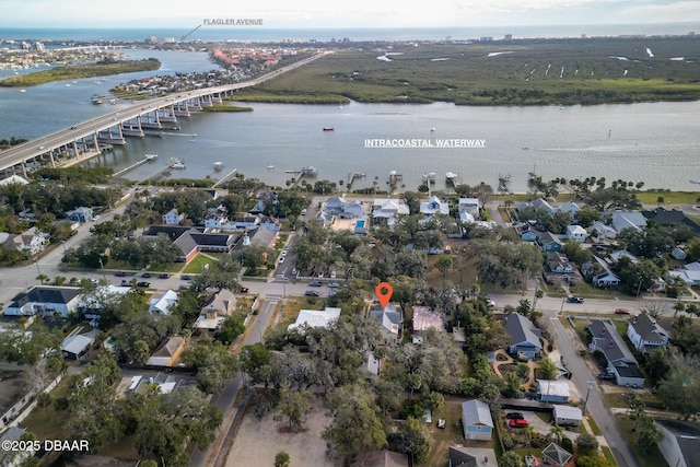 drone / aerial view with a water view