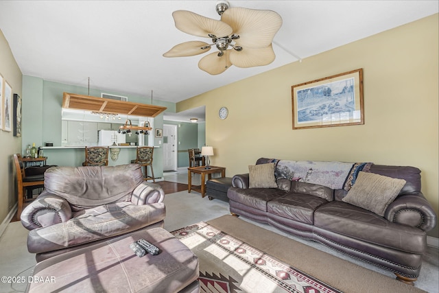 living room featuring ceiling fan