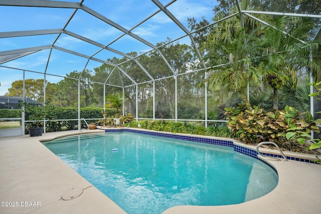 view of pool featuring a lanai and a patio area