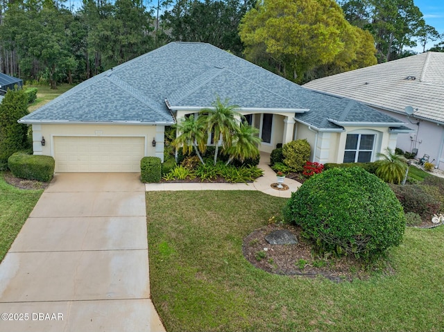 32 Gale Ln, Ormond Beach, FL 32174 - single story home with a shingled roof, an attached garage, concrete driveway, a front lawn, and stucco siding