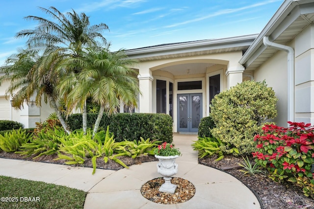 entrance to property featuring french doors