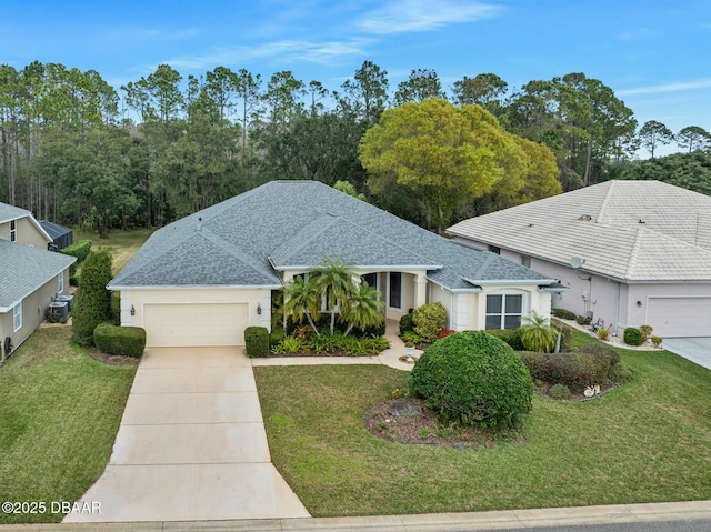 ranch-style home featuring a garage and a front lawn