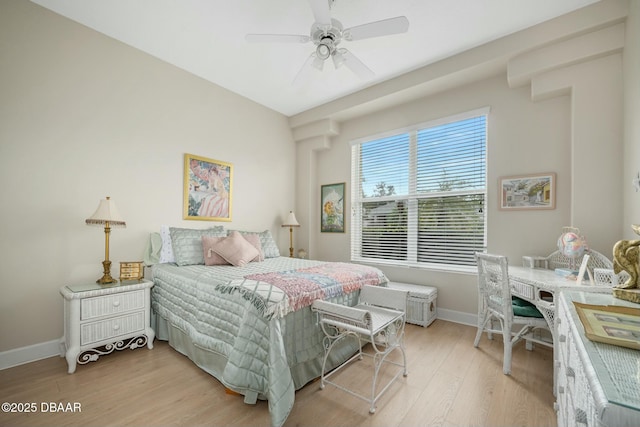 bedroom featuring light hardwood / wood-style floors and ceiling fan