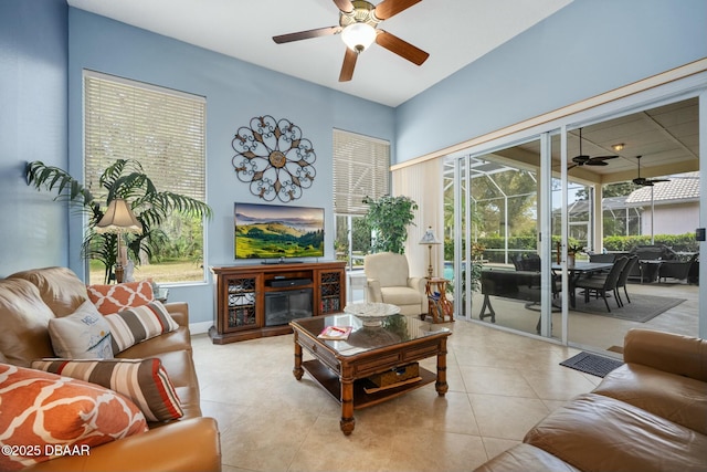 living room with light tile patterned flooring and ceiling fan