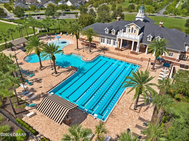 view of pool featuring a patio