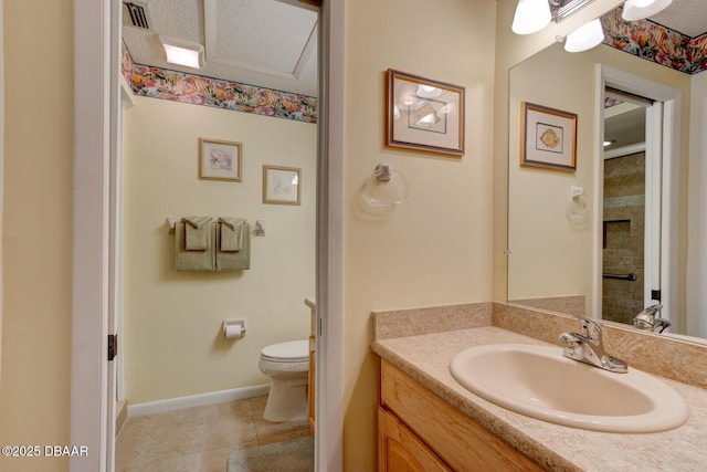 bathroom with a textured ceiling, toilet, visible vents, vanity, and tile patterned floors