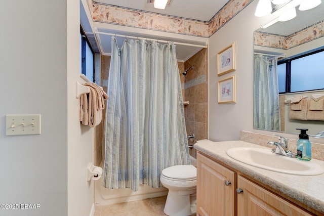 bathroom with vanity, toilet, and shower / tub combo with curtain