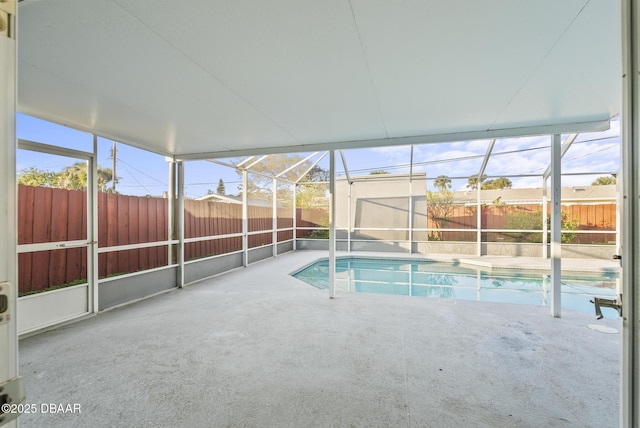 view of pool featuring a lanai and a patio