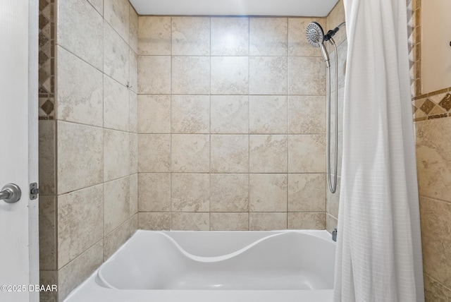 bathroom featuring shower / bathtub combination with curtain