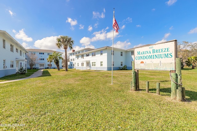 500 S Beach St Unit C4, Daytona Beach, FL 32114 - view of property's community with a residential view and a lawn