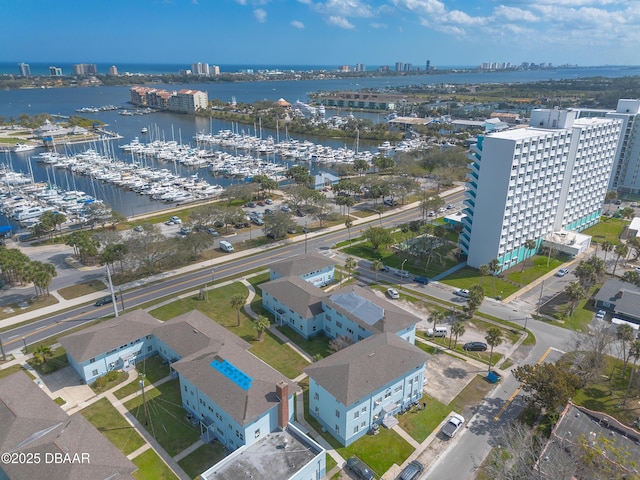 drone / aerial view with a water view and a view of city