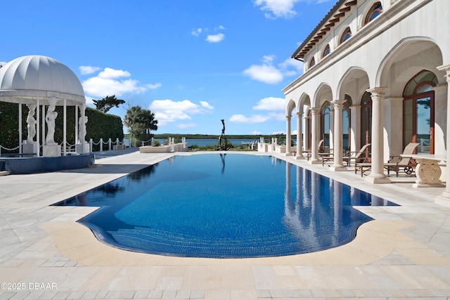 pool featuring a patio