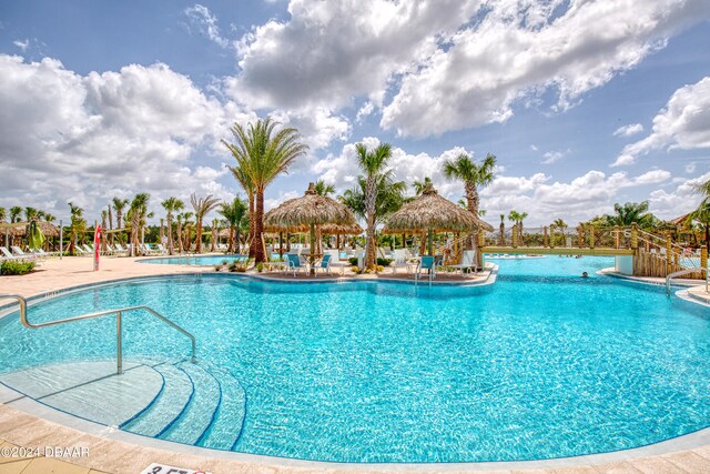 view of pool with a patio and a gazebo