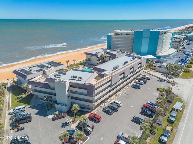 aerial view featuring a beach view and a water view