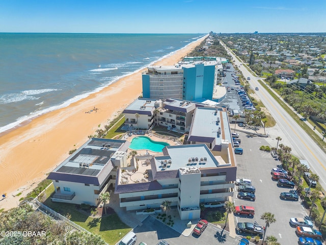 aerial view with a view of the beach and a water view