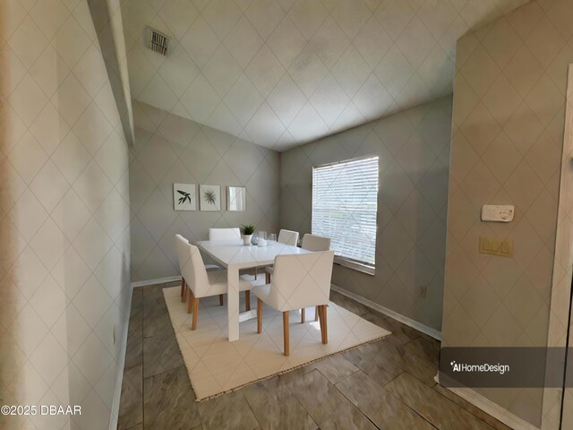 dining space featuring tile patterned floors