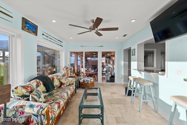 living room with ceiling fan