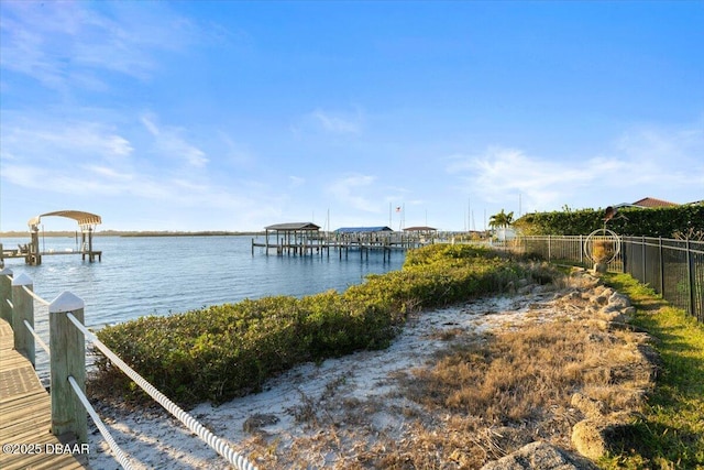 property view of water featuring a boat dock