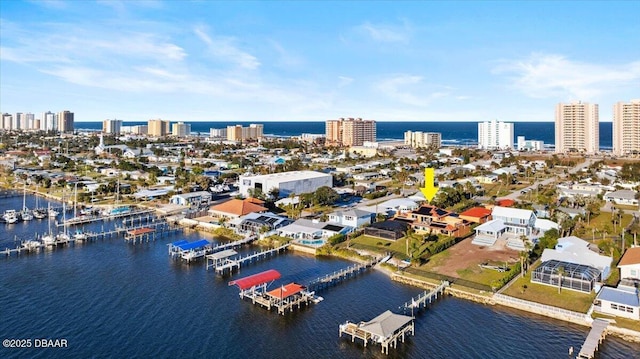 bird's eye view with a water view