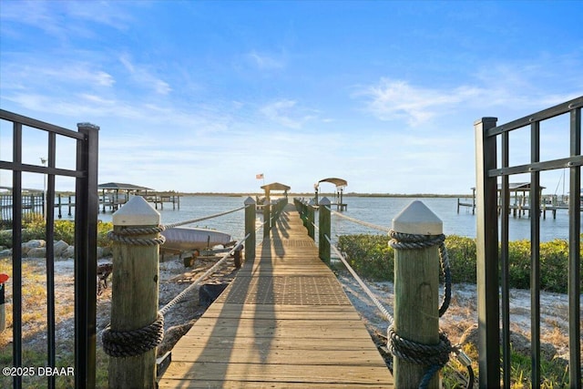 view of dock with a water view