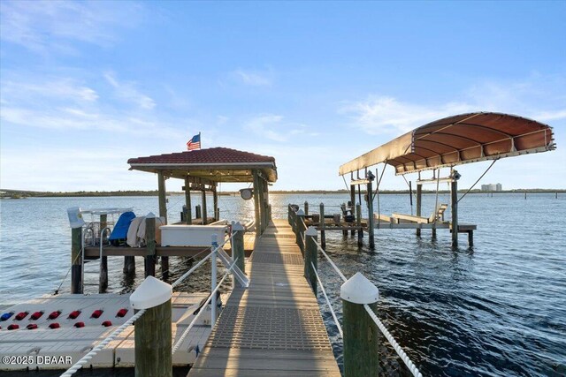 dock area featuring a water view