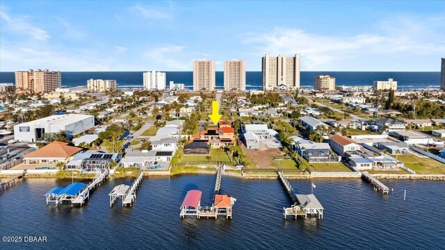 drone / aerial view featuring a water view