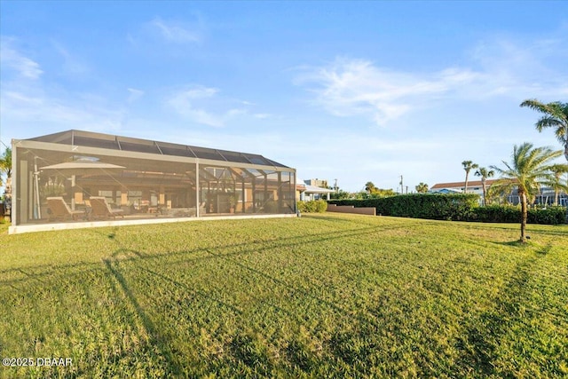 view of yard with a lanai