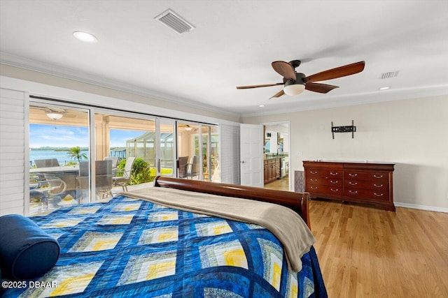 bedroom with ceiling fan, access to exterior, crown molding, and light hardwood / wood-style floors