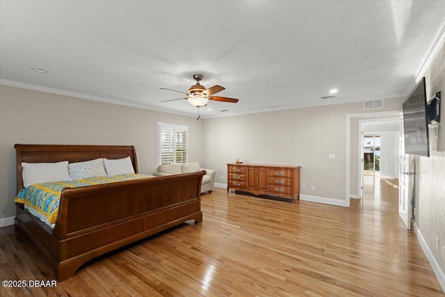 bedroom with ceiling fan, ornamental molding, and light hardwood / wood-style flooring