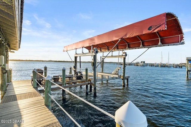 dock area featuring a water view