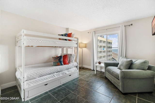 bedroom with a textured ceiling