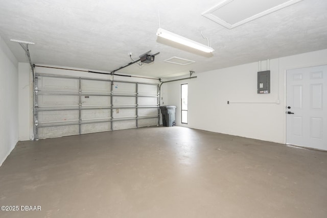 garage featuring a garage door opener and electric panel