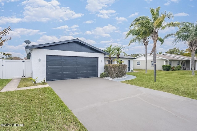 single story home featuring a garage and a front lawn