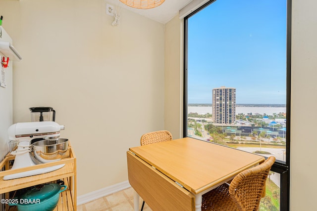 dining room with a water view