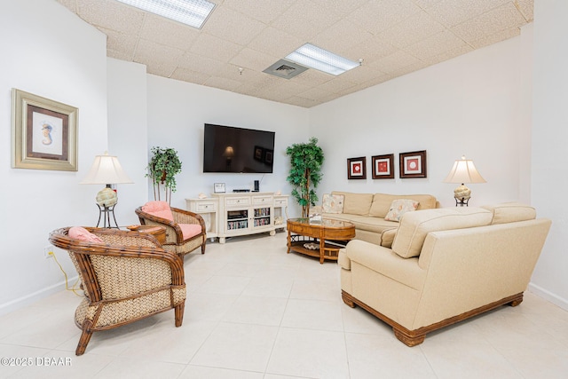 living room with tile patterned flooring