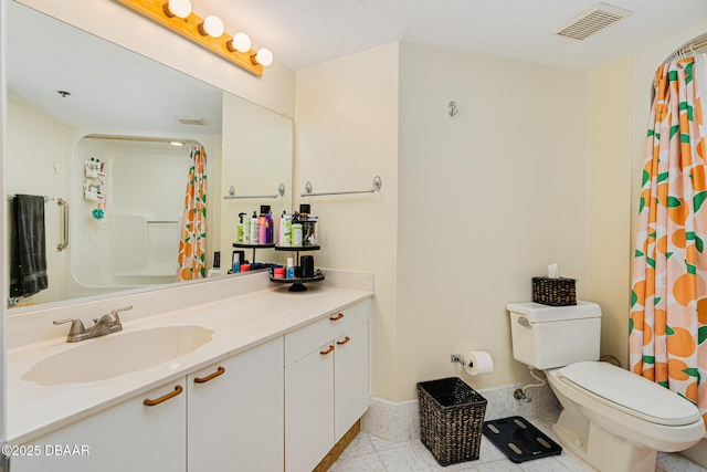 bathroom featuring toilet, a shower with shower curtain, vanity, and tile patterned flooring