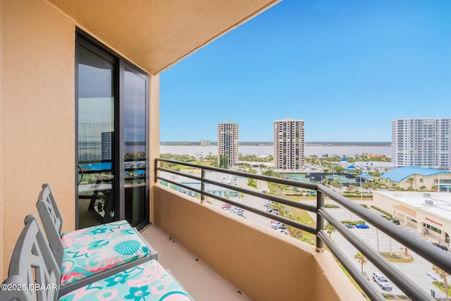 balcony featuring a water view