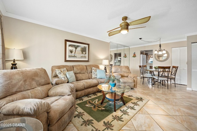 tiled living room with a textured ceiling, ornamental molding, and ceiling fan