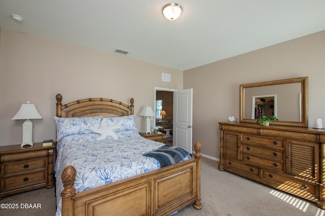 bedroom with light carpet, baseboards, and visible vents