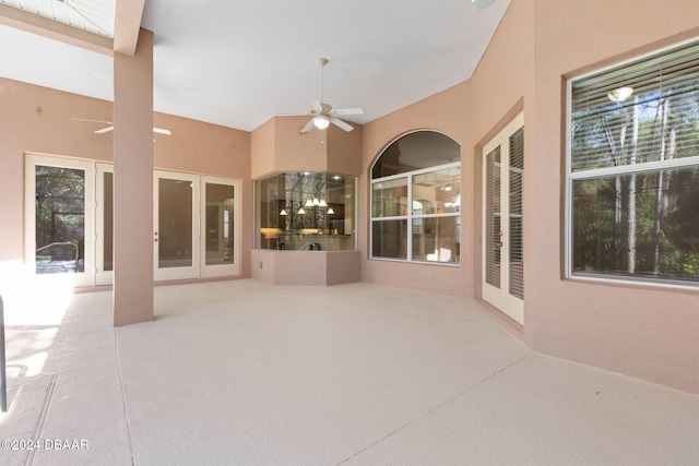 view of patio with ceiling fan and french doors