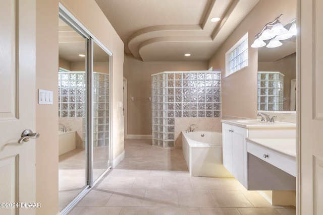 3404 Rexford Cir, Ormond Beach, FL 32174 - full bathroom with a bath, vanity, a tile shower, tile patterned floors, and recessed lighting