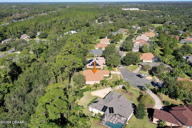 3404 Rexford Cir, Ormond Beach, FL 32174 - aerial view of property and surrounding area featuring a forest and nearby suburban area