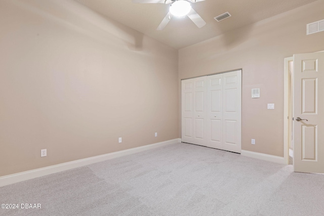 3404 Rexford Cir, Ormond Beach, FL 32174 - unfurnished bedroom with light colored carpet, a closet, ceiling fan, and baseboards