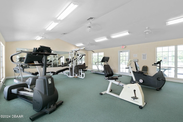 gym featuring ceiling fan and vaulted ceiling