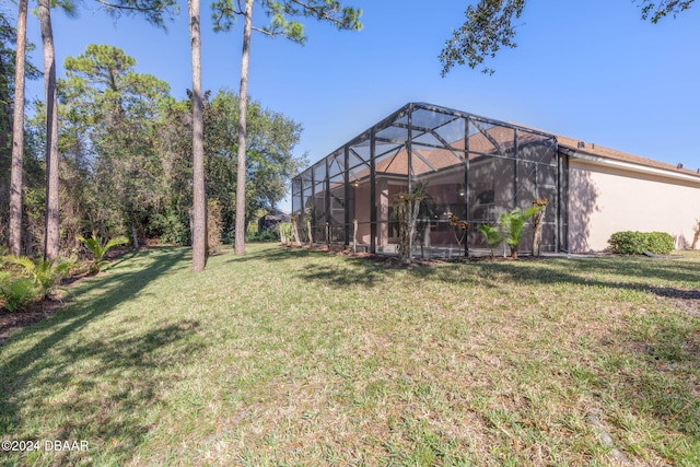 3404 Rexford Cir, Ormond Beach, FL 32174 - view of green lawn with a lanai
