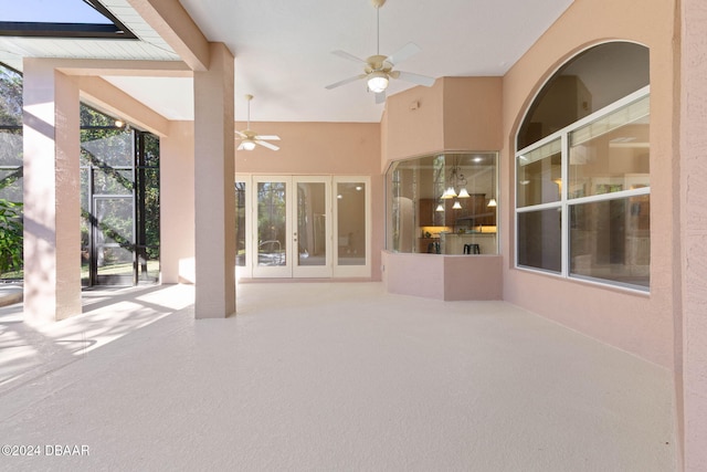 view of patio with french doors and ceiling fan