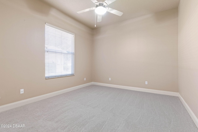 3404 Rexford Cir, Ormond Beach, FL 32174 - carpeted spare room featuring a ceiling fan and baseboards
